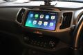 KIA Sportage 2010-15 OEM Style radio installed image, what it looks like, with CarPlay/Android auto option for Kia Sportage	